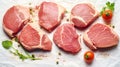 Fresh possibilities, Raw pork steaks presented on parchment