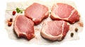 Fresh possibilities, Raw pork steaks presented on parchment