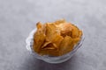 Fresh potato chips stock image with textured background. Royalty Free Stock Photo