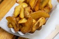 Fresh potato wedges as a snack Royalty Free Stock Photo