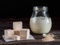 Fresh pressed yeast, dry instant yeast and active wheat sourdough starter on wooden table Royalty Free Stock Photo