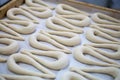 Fresh Pretzel, Brezel or Breze Dough on Tray Royalty Free Stock Photo