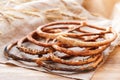 Fresh Pretzels with poppy seeds, cinnamon, sunflower seeds Royalty Free Stock Photo