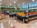 The fresh produce aisle of a Schnucks grocery store with colorful fresh fruits and vegetables ready to be purchased by consumers