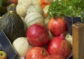 Fresh produce with pomegranates, cantaloupe, parsley