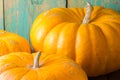 Fresh pumkins on wooden table Royalty Free Stock Photo