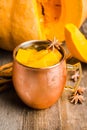 Fresh pumpkin cocktail in copper mug