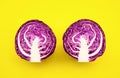 Fresh of purple cabbage half slicedon color background
