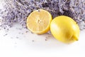 Fresh purple lavender with big whole lemon and slice on white