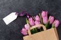 Fresh purple tulip flowers bag Royalty Free Stock Photo