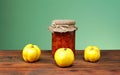 Fresh quince jam in a jar and glass