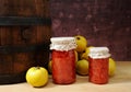 Fresh quince and jam in a jar