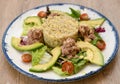 Fresh Quinoa Salad with Tuna, Avocado, and Cherry Tomatoes Royalty Free Stock Photo
