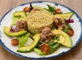 Fresh Quinoa Salad with Tuna, Avocado, and Cherry Tomatoes Royalty Free Stock Photo
