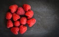 Fresh raspberries fruit on dark background Royalty Free Stock Photo