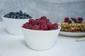 Fresh raspberries on a light background Royalty Free Stock Photo