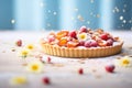 fresh raspberries spilling around a freshly-baked tart