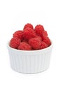 Fresh raspberries in white bowl Royalty Free Stock Photo