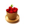 Fresh raspberries in a wooden bowl,