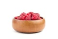 Fresh raspberries in wooden bowl isolated on white background. Red sweet raspberries Royalty Free Stock Photo