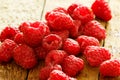 Fresh riperaspberries on the wooden table Royalty Free Stock Photo