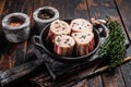 Fresh Raw beef Marrow bones in pan for cooking broth. Wooden background. Top view Royalty Free Stock Photo