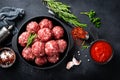 Fresh raw beef meatballs with spices