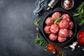 Fresh raw beef meatballs with spices