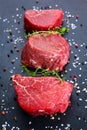 Fresh Raw Beef steak Mignon, with salt, peppercorns, thyme, garlic. Royalty Free Stock Photo