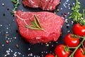 Fresh Raw Beef steak Mignon, with salt, peppercorns, thyme, garlic Ready to cook Royalty Free Stock Photo