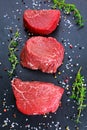 Fresh Raw Beef steak Mignon, with salt, peppercorns, thyme, garlic Ready to cook Royalty Free Stock Photo