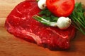 Fresh raw beef steak and vegetables Royalty Free Stock Photo