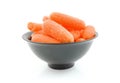 Fresh raw carrots in black bowl Royalty Free Stock Photo