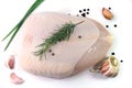 Fresh raw chicken breast, double, whole, with herbs, pepper, garlic, isolated on white background