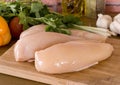 Fresh raw chicken breasts and vegetables Royalty Free Stock Photo