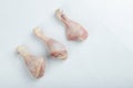 Fresh raw chicken drumsticks on white table Royalty Free Stock Photo