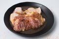 Fresh raw chicken meat seasoned with honey and sauce on black di Royalty Free Stock Photo