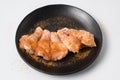 Fresh raw chicken meat seasoned with spices and chili on black d Royalty Free Stock Photo