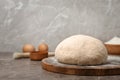 Fresh raw dough ball on wooden board Royalty Free Stock Photo