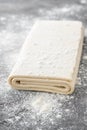 Fresh raw dough on table. Puff pastry. Copy space. Royalty Free Stock Photo