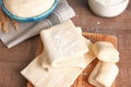 Fresh raw dough on wooden board Royalty Free Stock Photo