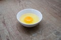 Fresh raw egg bowl on white background with Light and shadow from the window in the morning Royalty Free Stock Photo