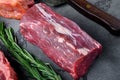 Fresh and raw fillet meat. Whole piece of beef tenderloin steaks, on gray stone background Royalty Free Stock Photo