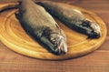 Fresh raw fish trout is two pieces on the board Royalty Free Stock Photo