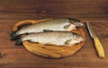 Fresh raw fish trout is two pieces on the board Royalty Free Stock Photo