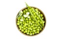 Fresh raw green peas Pisum sativum in a wooden bowl Royalty Free Stock Photo