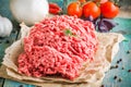 Fresh raw ground beef on a paper