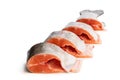 Fresh raw headless rainbow trout fish cut into pieces isolated on white