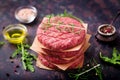 Fresh raw homemade minced beef steak burger with spices Royalty Free Stock Photo