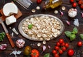 Fresh raw  italian pasta orecchiette, vegetables, herbs and olive oil Royalty Free Stock Photo